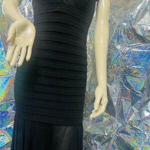 Betsy & Adam Black Ruched Gownget ready for this holiday or special occasion